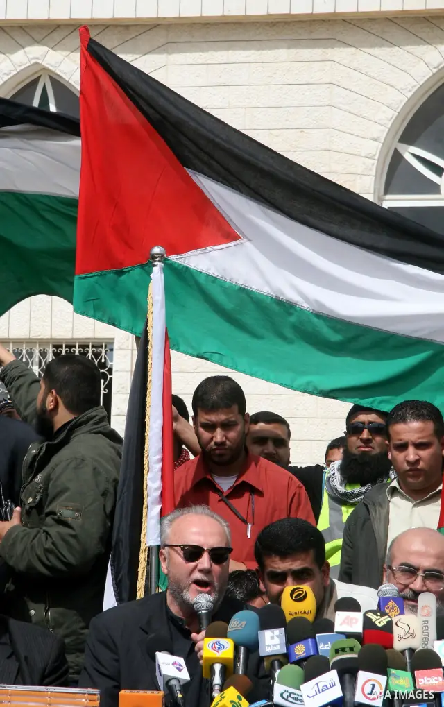 British lawmaker George Galloway gestures talks during a press conference in Gaza City, 10 March 2009. British MP George Galloway arrived in Gaza at the head of an aid convoy to protest what he called Israel's 'genocidal...