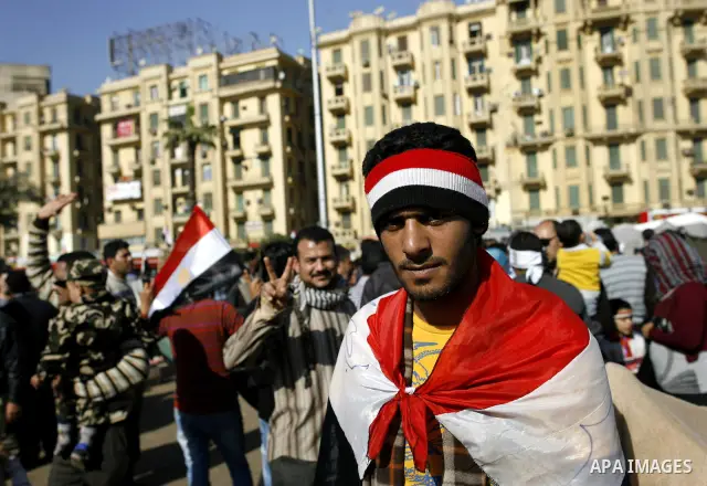 Egyptian protesters take part a demonstration at the Tahrir square in Cairo, Egypt, Thuresday, March 3, 2011. hundreds of protesters are camping at the Tahrir square in an ongoing campaign demanding the resignation of th...