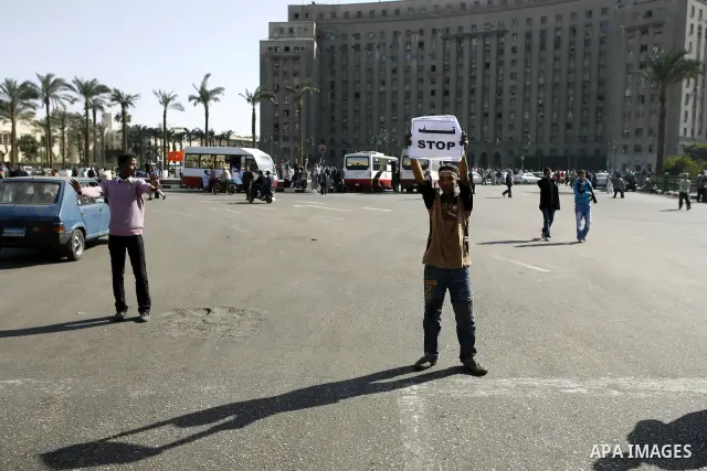 Egyptian protesters take part in a demonstration at the Tahrir square in Cairo, Egypt, Thuresday, March 3, 2011. hundreds of protesters are camping at the Tahrir square in an ongoing campaign demanding the resignation of...