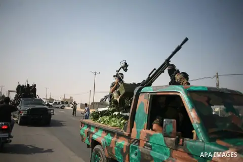 Palestinian Hamas militants take part in a rally on October 18, 2012 at the Rafah border crossing with Egypt in the southern Gaza Strip to mark the first anniversary of a deal which saw the exchange of 1,027 Palestinian...