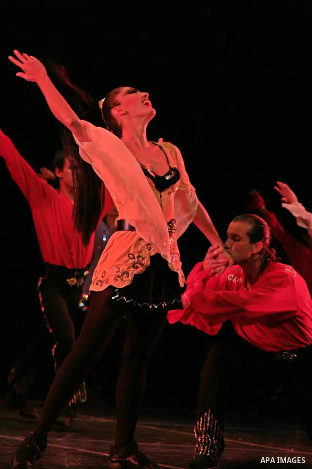 A Dancers from the Turkish company "Fire of Anatolia" perform during the Palestine International Festival in the West Bank city of Ramallah July 7, 2009. Photo by Issam Rimawi