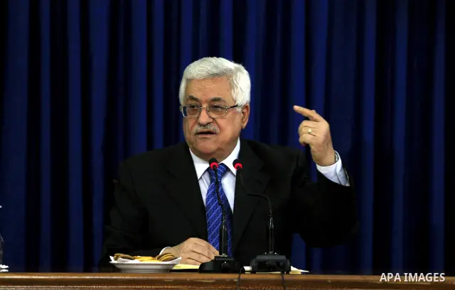 Palestinian President Mahmoud Abbas addresses during a meeting of the Central Committee and Revolutionary Council of the Palestinian National Liberation Movement Fatah in the West Bank city of Ramallah Aug 16, 2009. Phot...