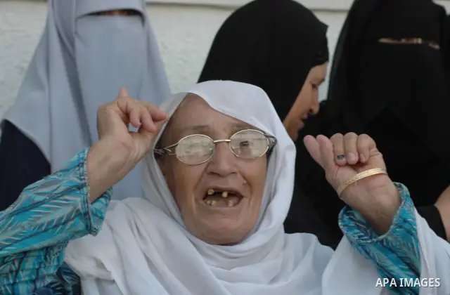 Palestinian women attend a protest calling for doctors to stop their strike, in the southern Gaza strip. At 11am each day, all pro-Fatah doctors suspend work and leave hospitals. Hamas officials of the ministry of health...
