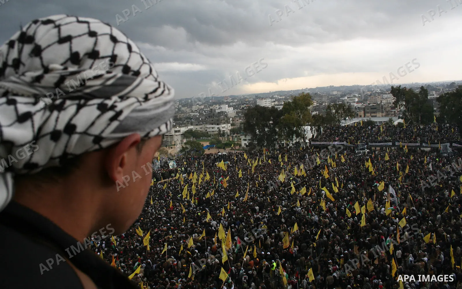 Palestinian Fatah militants, loyal to their leader Mahmud Abbas, participate in a rally in Gaza City to celebrate 42 years since the party's founding. Abbas dug in his heels in a standoff with the ruling Hamas movement t...