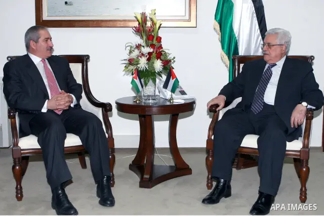 Palestinian President Mahmoud Abbas, meet with with the Jordanian Foreign Minister Nasser Judeh, in the West Bank city of Ramallah, on March 07, 2012. Photo by Thaer Ganaim