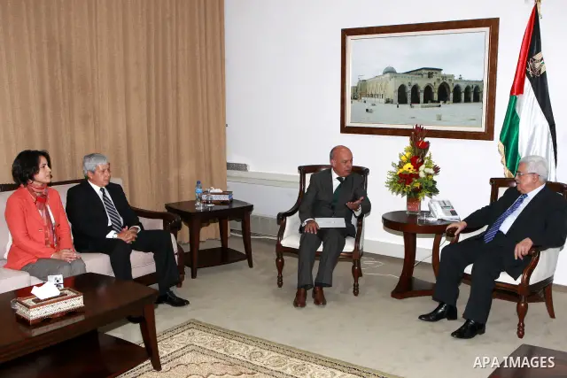 Palestinian President, Mahmoud Abbas (Abu Mazen), meets with the deputy foreign minister of Peru, in the West Bank city of Ramallah on March 20, 2012. Photo by Thaer Ganaim