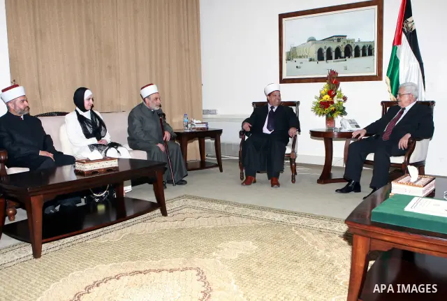 Palestinian President, Mahmoud Abbas (Abu Mazen), meets with the delegation of eliminating the legitimate Palestinian, in the West Bank city of Ramallah on March 20, 2012. Photo by Thaer Ganaim