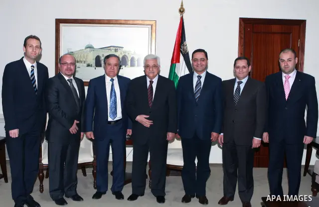 Palestinian President, Mahmoud Abbas (Abu Mazen), meets with the delegation of the Arab Society for hotels, in the West Bank city of Ramallah on March 20, 2012. Photo by Thaer Ganaim