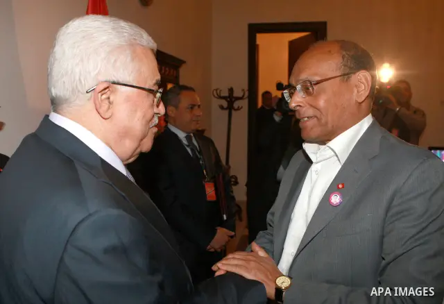 Palestinian President, Mahmoud Abbas (Abu Mazen), meets with Tunisian President Moncef Marzouki, in the Iraqi capital Baghdad, on Mar. 28, 2012. Photo by Thaer Ganaim