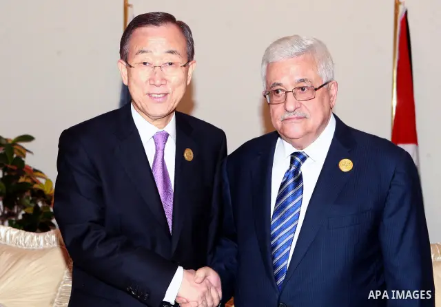 Palestinian President Mahmoud Abbas meets with UN Secretary-General Ban Ki-moon in Baghdad, Iraq, Thursday, March, 29, 2012. The annual Arab summit meeting opened in the Iraqi capital Baghdad on Thursday with only 10 of...