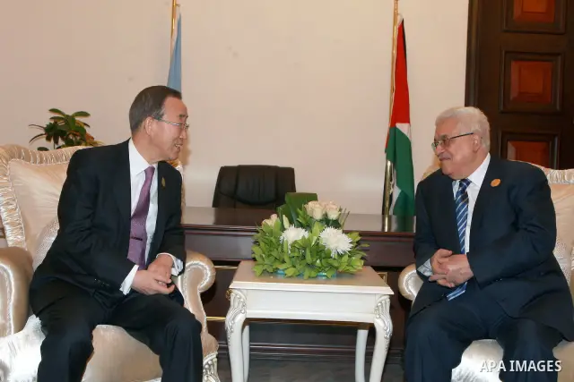 Palestinian President Mahmoud Abbas meets with UN Secretary-General Ban Ki-moon in Baghdad, Iraq, Thursday, March, 29, 2012. The annual Arab summit meeting opened in the Iraqi capital Baghdad on Thursday with only 10 of...