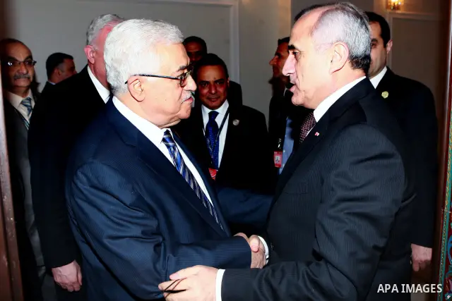 Palestinian President Mahmoud Abbas meets with Lebanese President Michel Suleiman in Baghdad, Iraq, Thursday, March, 29, 2012. The annual Arab summit meeting opened in the Iraqi capital Baghdad on Thursday with only 10 o...