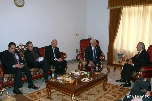 Palestinian President Mahmoud Abbas meets with Lebanese President Michel Suleiman in Baghdad, Iraq, Thursday, March, 29, 2012. The annual Arab summit meeting opened in the Iraqi capital Baghdad on Thursday with only 10 o...