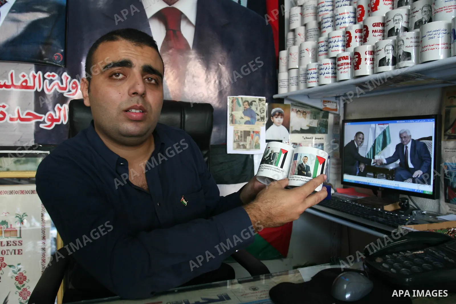Coffee mugs with pictures of US Democratic presidential candidate Barack Obama and Islamic Hamas leader Ismail Haniya are see for sale in a shop in Gaza City. The mugs read "Hey!!! Come and drink the Palestinian coffee w...