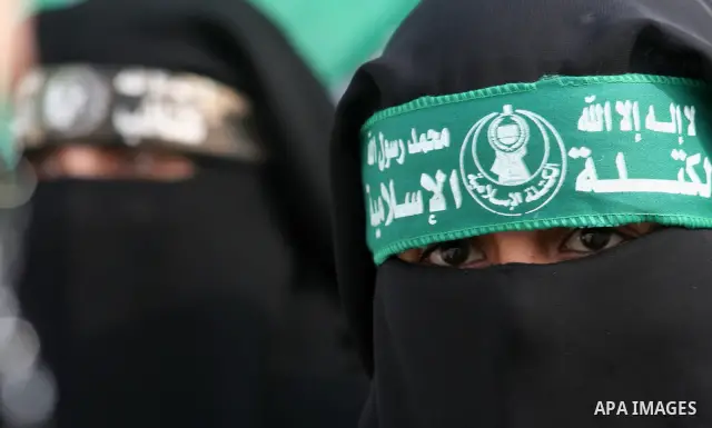 Palestinian women, supporters of Hamas Islamist movement, attend a protest in Gaza City against what the Islamists say is the arrest of hundreds of its members by Palestinian authorities in the West Bank. Hamas said last...