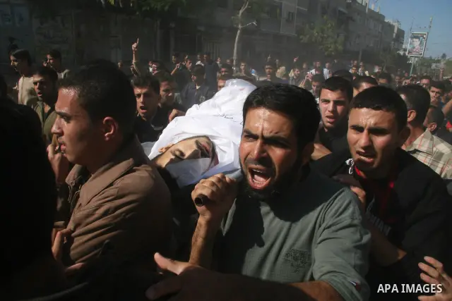 Palestinians attend the funeral of five Hamas fighters killed in an overnight Israeli army operation in Deir al-Balah, near the border between the Gaza Strip and Israel, in Khan Yunis. Dozens of rockets were fired at Isr...