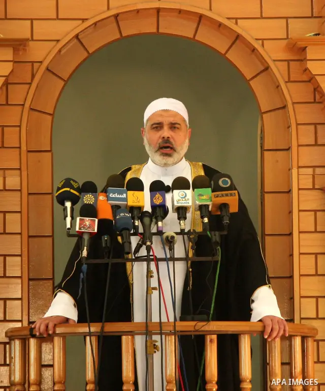 Deposed Palestinian Prime Minister Ismail Haniyeh declaims during the friday prayers at the West Mosque, in Gaza City.