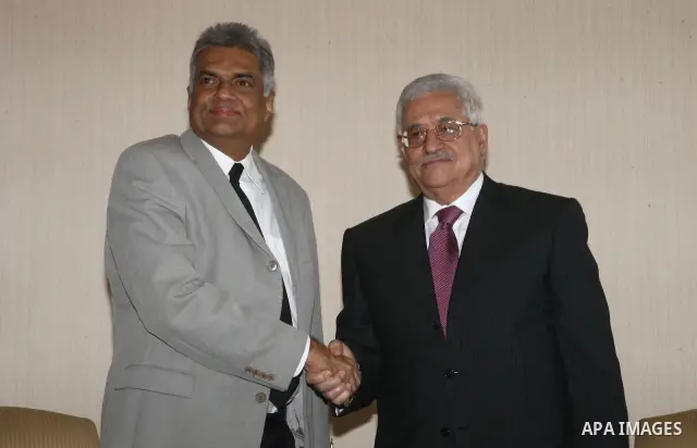 Palestinian President Mahmoud Abbas meets with head of the opposition party in Sri Lanka's capital of Colombo.