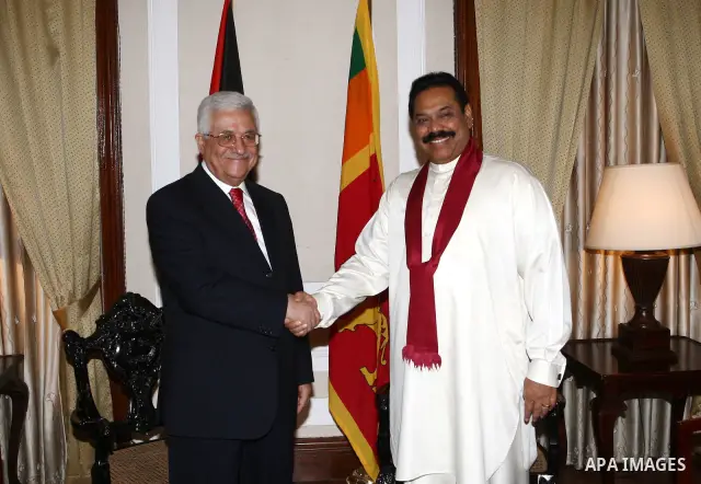 Palestinian President Mahmoud Abbas meets the Sri Lankan President Mhenda Raja Biska in Sri Lanka's capital of Colombo.