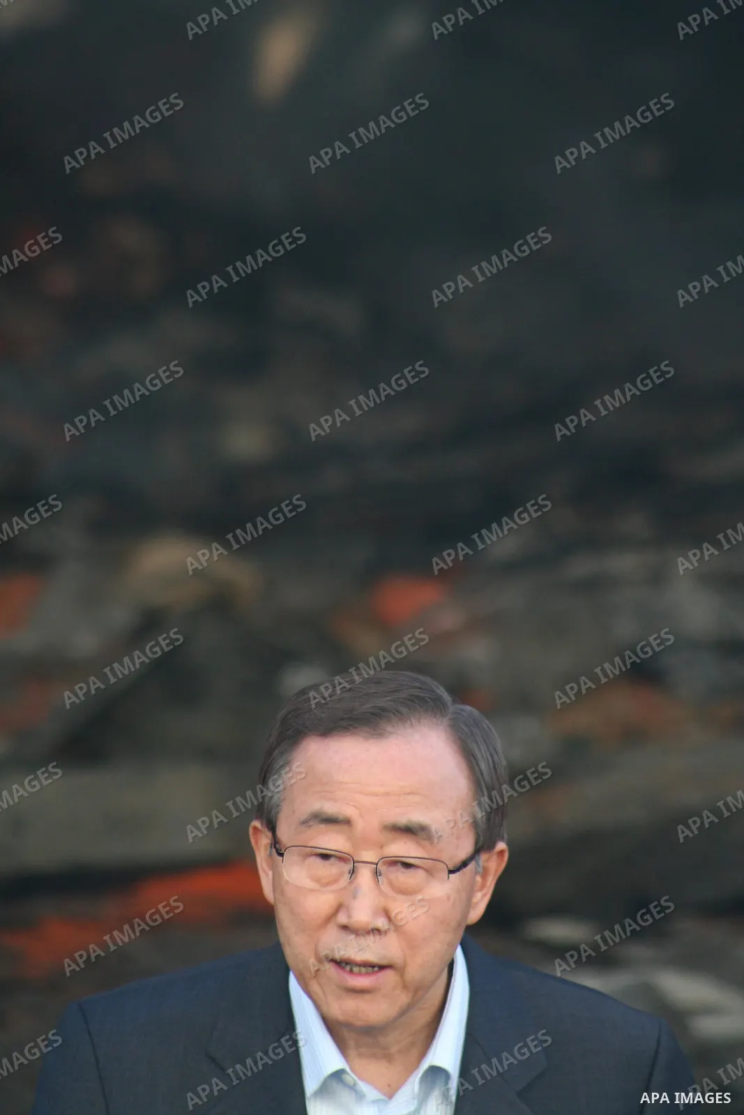 UN Secretary General Ban Ki-moon taken speaks to the press in front of the rubble of the United Nations Relief and Works Agency (UNRWA) warehouse destroyed during Israeli strikes in Gaza, January 20. APAIMAGES PHOTO / As...