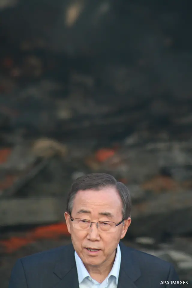UN Secretary General Ban Ki-moon taken speaks to the press in front of the rubble of the United Nations Relief and Works Agency (UNRWA) warehouse destroyed during Israeli strikes in Gaza, January 20. APAIMAGES PHOTO / As...