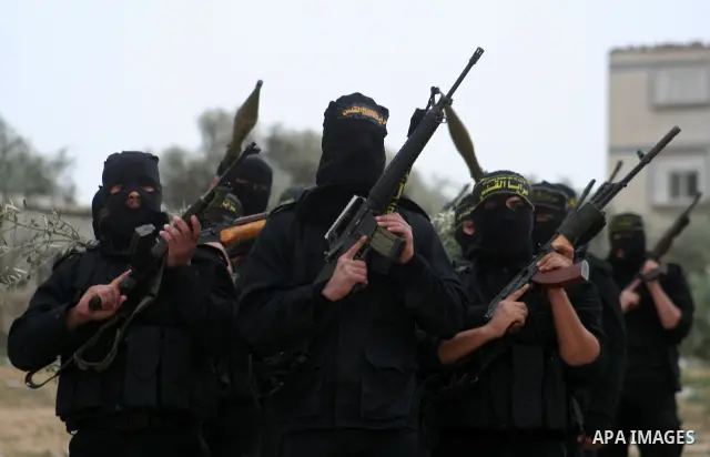 Palestinian Islamic Jihad militants train during a military exercise in Gaza City on February 10, 2009. Israel voted in a tight race between hawkish former premier Benjamin Netanyahu and centrist Foreign Minister Tzipi L...