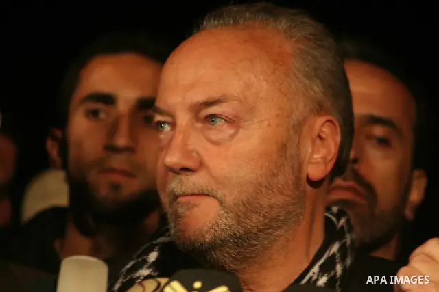 British lawmaker George Galloway, second from left, walks with a Hamas official after having crossed with his entourage from Egypt through the Rafah border crossing to Gaza, in Gaza City, Monday, March 9, 2009. On Monday...