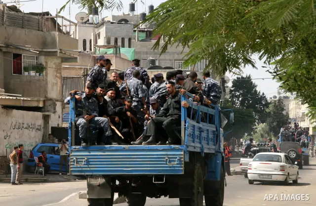 A Hamas Police officers during a military campaign against the Doghmush clan, a notorious family with links to both militant and criminal groups, in Gaza City. Hamas forces assaulted the compound of a heavily armed Gaza...