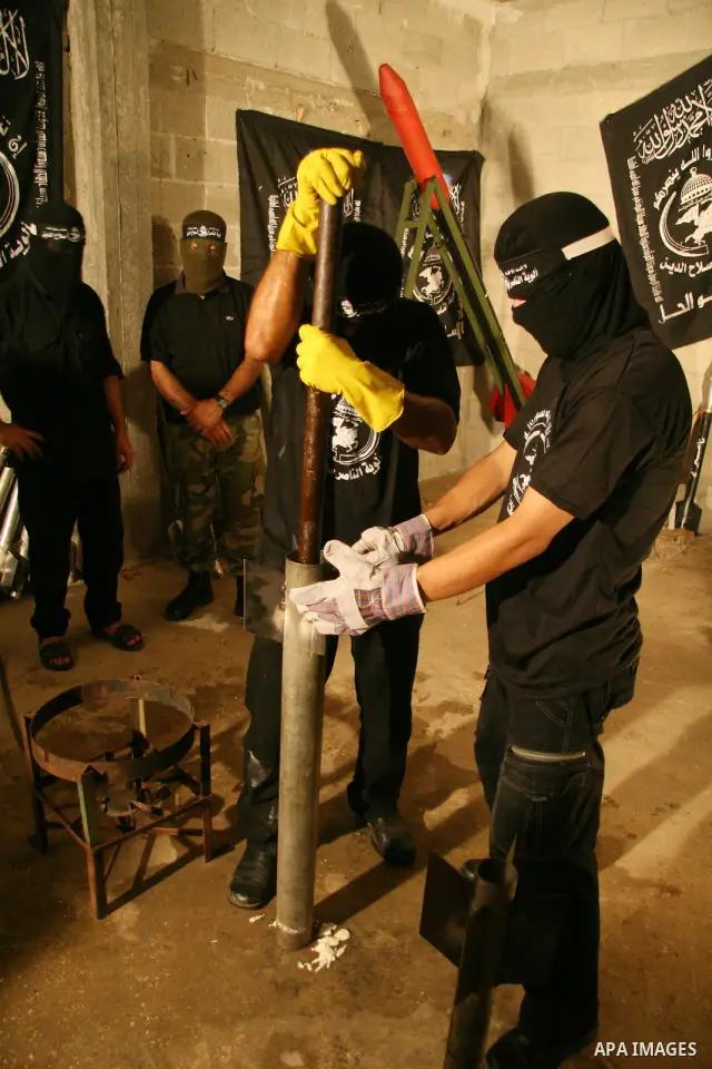 A Militants of El-Naser Salah El-Deen brigades of the popular resistance, during they prefabricate a homemade rockets and landmines, in Gaza Strip. Abu Abeer the commander of El-Naser Salah El-Deen brigades said that the...