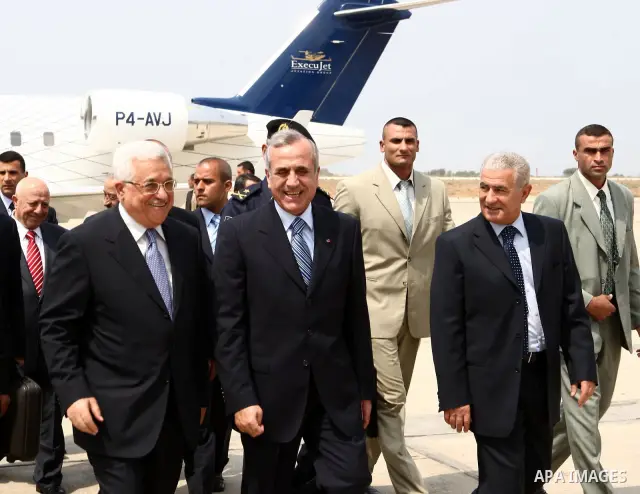 Palestinian President Mahmoud Abbas is received by Lebanese President Michel Suleiman during his arrive in Beirut airport, in the Lebanon's capital of Beirut.
