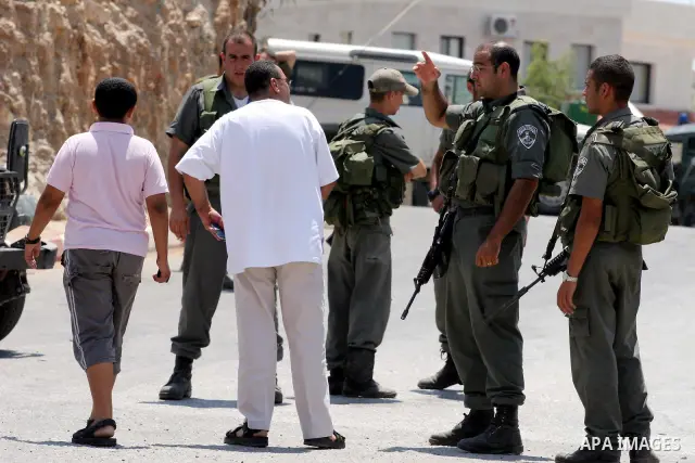 Israeli army impose a curfew on the West Bank village of Bilin, near Ramallah. Palestinian, Israeli, and international activists have held weekly protests for more than two years in Bilin against the Israel's constructio...