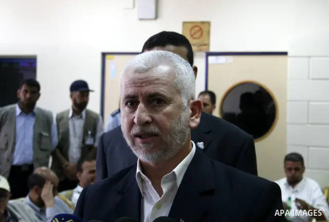 Palestinian former interior minister Said Siam speaks to the press at the Rafah border terminal crossing between the southern Gaza Strip and Egypt. A Hamas delegation is due in Cairo for talks on a fragile three-week-old...
