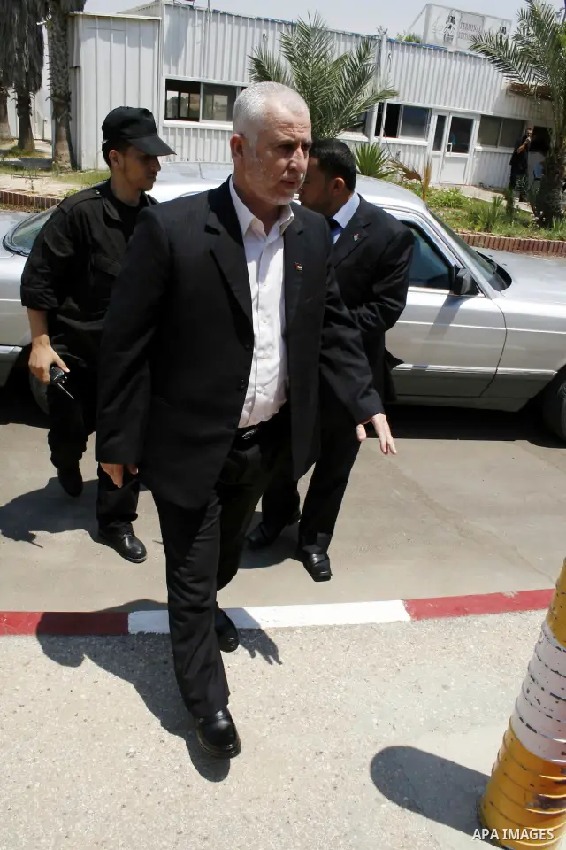 Palestinian former interior minister Said Siam walks through the Rafah border terminal crossing between the southern Gaza Strip and Egypt. A Hamas delegation is due in Cairo for talks on a fragile three-week-old Gaza tru...