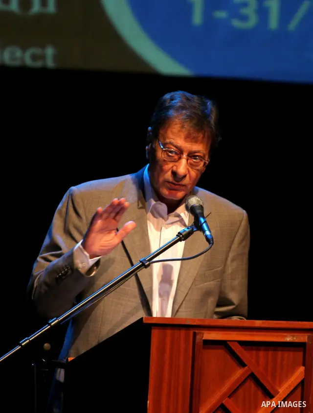 Palestinian poet Mahmoud Darwish presents a poetry soiree, in the West Bank city of Ramallah.
