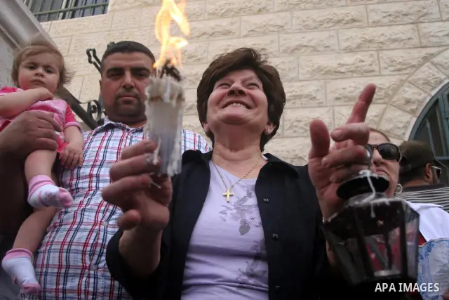 Palestinian Christians attends the ceremony of the Holy Fire in the West Bank city of Ramallah. The Holy Fire ceremony is part of Orthodox Easter rituals and the flame symbolizes the resurrection of Christ. The ceremony...