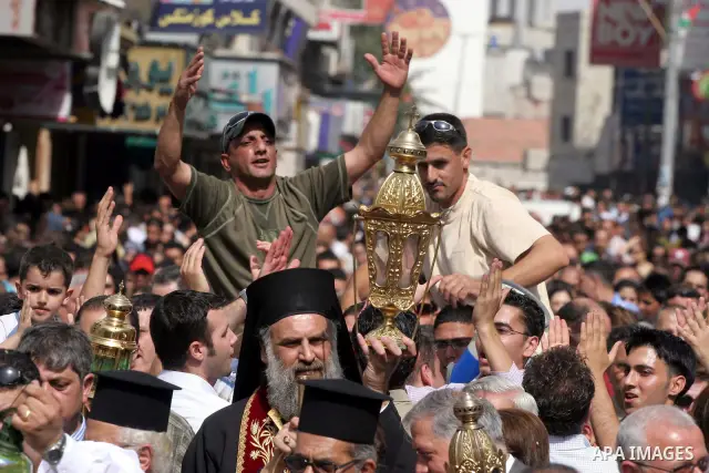 Palestinian Christians attends the ceremony of the Holy Fire in the West Bank city of Ramallah. The Holy Fire ceremony is part of Orthodox Easter rituals and the flame symbolizes the resurrection of Christ. The ceremony...