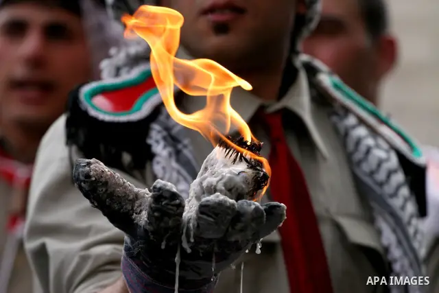 Palestinian Christians attends the ceremony of the Holy Fire in the West Bank city of Ramallah. The Holy Fire ceremony is part of Orthodox Easter rituals and the flame symbolizes the resurrection of Christ. The ceremony...
