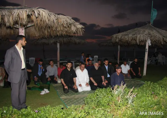 Palestinian Prime Minister of Hamas Ismail Haniyeh is seen on the shore of the Sea of Gaza shortly before the start of the truce with Israel..