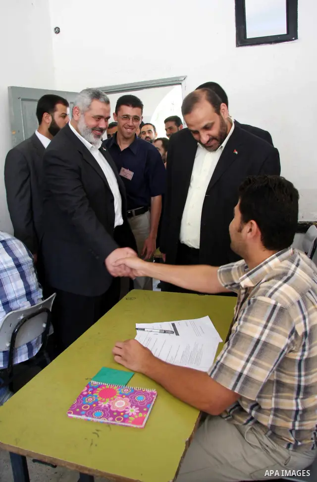 Palestinian Prime Minister of Hamas Ismail Haniyeh,inspects the committees of recruitment examinations at Al-Karmel school in Gaza City. The Hamas-run interior ministry in Gaza said on Monday five Fatah members had been...