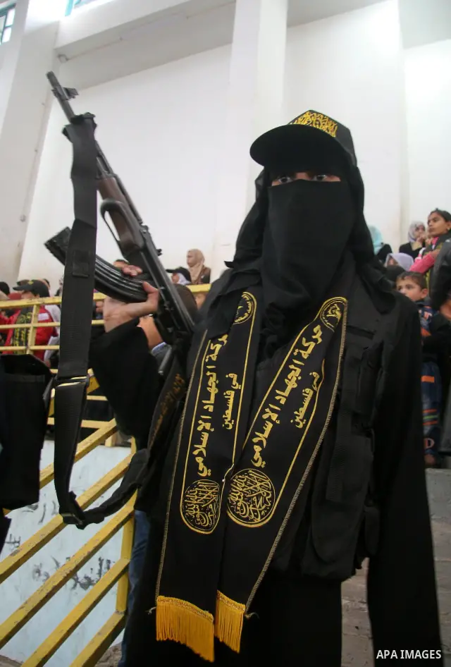 Palestinian supporters of Islamic Jihad movement attend an anti-Israel rally in Bureij refugee camp, central Gaza Strip December 26, 2008. Israeli defense officials say politicians have approved a large-scale incursion i...