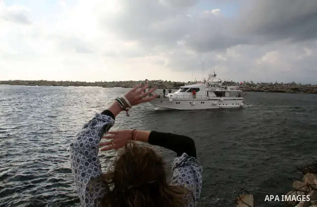 Palestinians receive a boat carrying a group of pro-Palestinian peace activists and European politicians upon its arrival in Gaza City. Israel allowed the "Dignity," a small yacht, to sail to the Gaza Strip in the fourth...