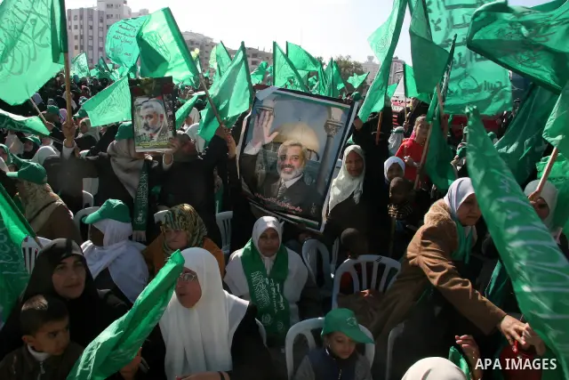 Tens of thousands of Hamas supporters attend a rally marking the 21st anniversary of the Islamist movement's creation in Gaza City. In an address to the crowds, Ismail Haniya, the head of the Hamas administration in Gaza...