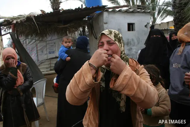 Palestinian relatives of 10-year-old Tamir Abu Shair, who was killed by Israeli soldiers on Tuesday, mourns during his funeral in Deer El-Balah city, central Gaza Strip. Israeli soldiers shot and killed a 10-year-old boy...