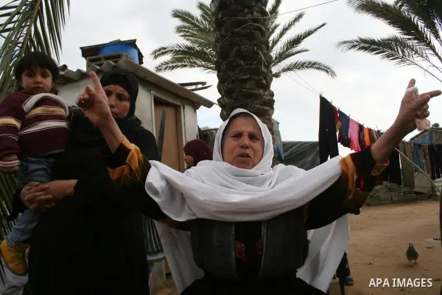 Palestinian relatives of 10-year-old Tamir Abu Shair, who was killed by Israeli soldiers on Tuesday, mourns during his funeral in Deer El-Balah city, central Gaza Strip. Israeli soldiers shot and killed a 10-year-old boy...