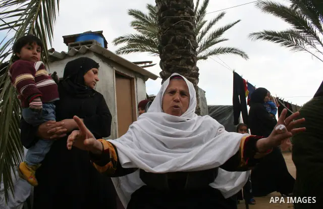 Palestinian relatives of 10-year-old Tamir Abu Shair, who was killed by Israeli soldiers on Tuesday, mourns during his funeral in Deer El-Balah city, central Gaza Strip. Israeli soldiers shot and killed a 10-year-old boy...