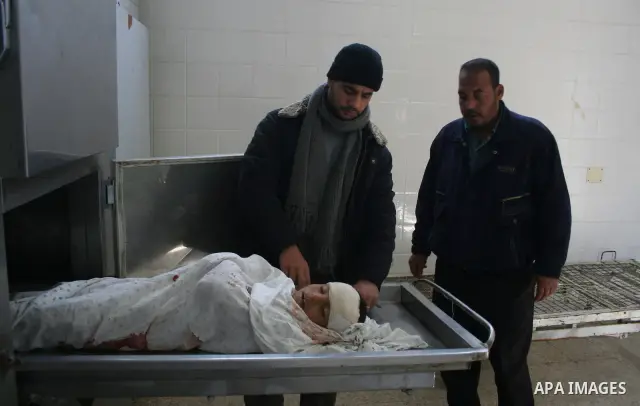 Palestinian relatives of 10-year-old Tamir Abu Shair, who was killed by Israeli soldiers on Tuesday, mourns over his body at the hospital morgue during his funeral in Deer El-Balah city, central Gaza Strip. Israeli soldi...