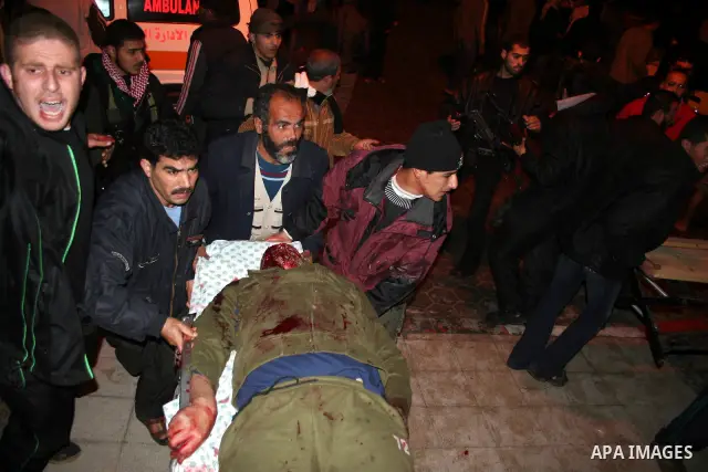 Wounded Palestinians are seen in hospital following an explosion at the home of senior Islamic Jihad leader Ayman Atallah Fayed in the Al-Burij refugee camp in Al-Burij, central Gaza Strip. At least nine people were kill...