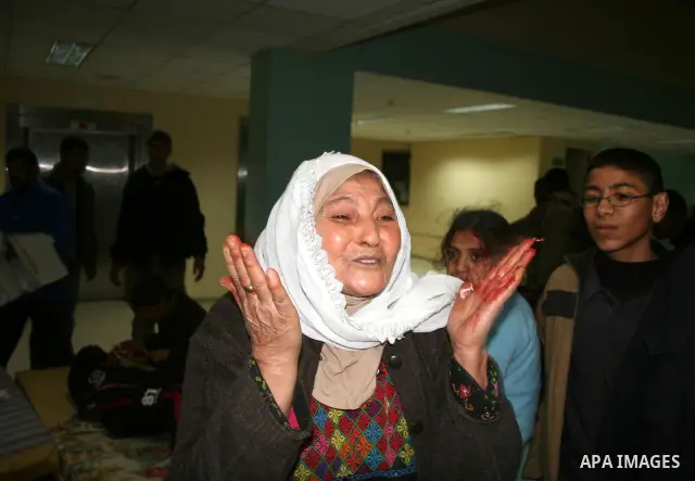 Wounded Palestinians are seen in hospital following an explosion at the home of senior Islamic Jihad leader Ayman Atallah Fayed in the Al-Burij refugee camp in Al-Burij, central Gaza Strip. At least nine people were kill...