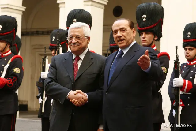 Palestinian President Mahmoud Abbas meets Italy Prime Minister Silvio Berlusconi, in the Italian capital of Rome.