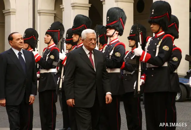 Palestinian President Mahmoud Abbas meets Italy Prime Minister Silvio Berlusconi, in the Italian capital of Rome.